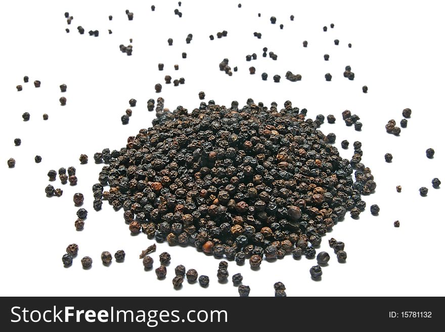 Heap of Black Pepper isolated on White