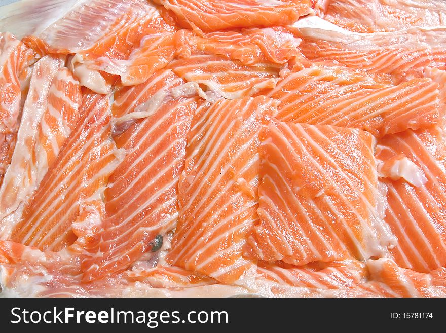 Fresh sliced salmon Fillet using as background