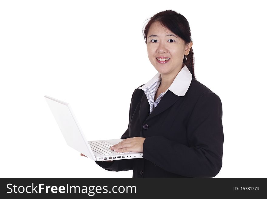An Asian businesswoman with a laptop. An Asian businesswoman with a laptop