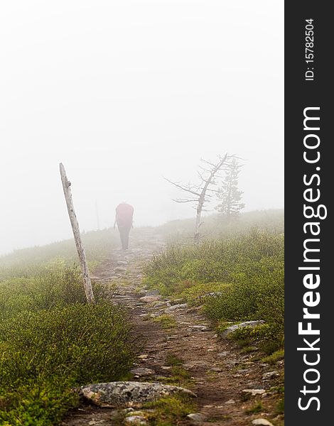 Hiker in Pallas-Hetta mountain region in Lapland, Northern Finland. Hiker in Pallas-Hetta mountain region in Lapland, Northern Finland.