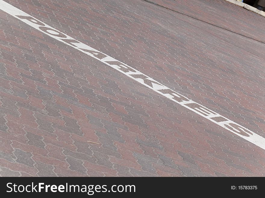 Arctic Circle sign painted on pavement.