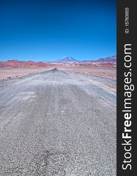 Road Leading towards the mountains in the Atacama Desert, Chile. Road Leading towards the mountains in the Atacama Desert, Chile