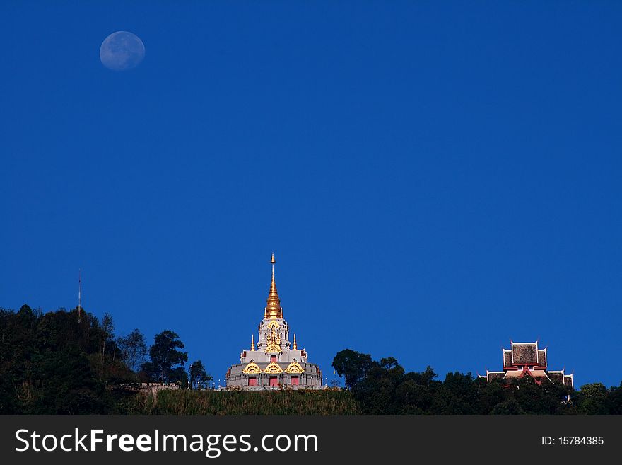 Temple on top of the mountain under moon. Temple on top of the mountain under moon