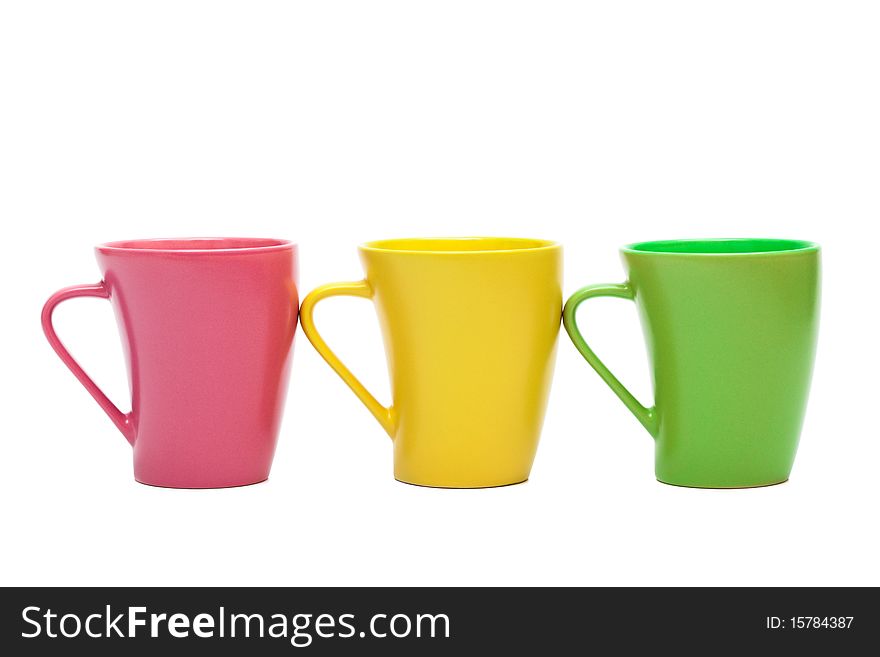 Beautiful color mugs on a white background