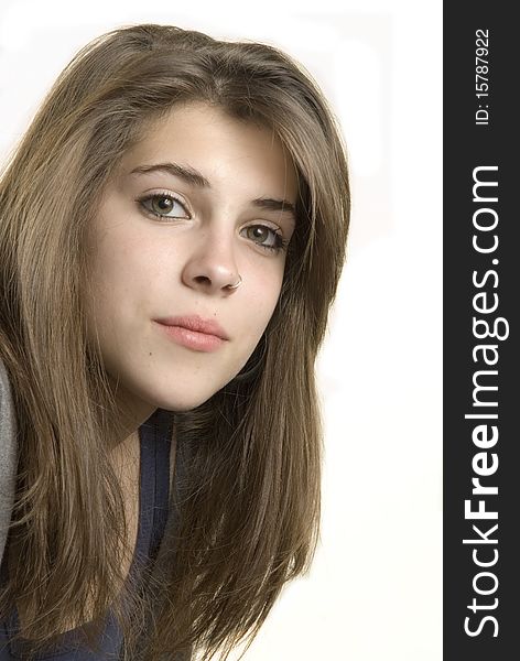 Young adolescent posing over white background. Young adolescent posing over white background