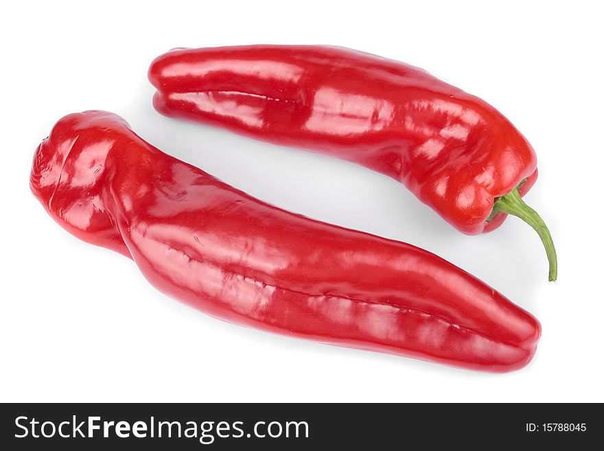 Sweet red peppers and chillies  over white. Sweet red peppers and chillies  over white