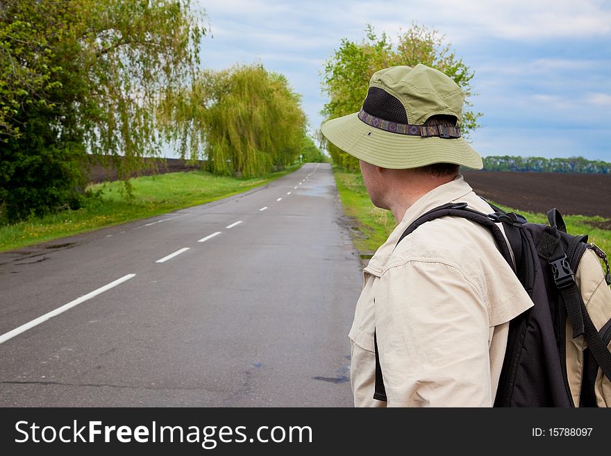 Tourist On A Country Road