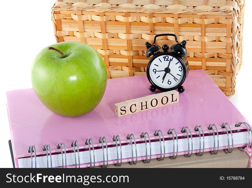 School notebooks and a healthy lunch isolated over white. School notebooks and a healthy lunch isolated over white