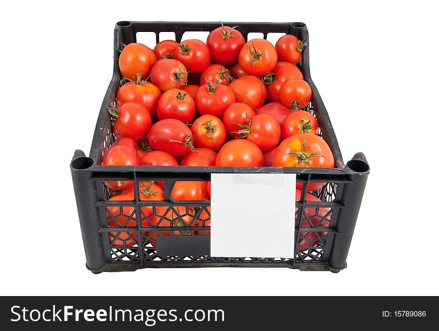 The box of different bright red tomatoes isolated on white. The box of different bright red tomatoes isolated on white