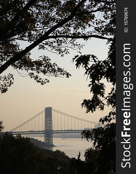 View from Washington bridge connecting New York and New Jersey at sunset. View from Washington bridge connecting New York and New Jersey at sunset