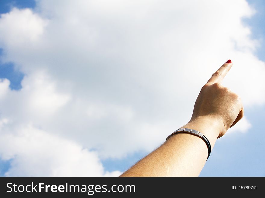 Some young woman pointing on background sky.