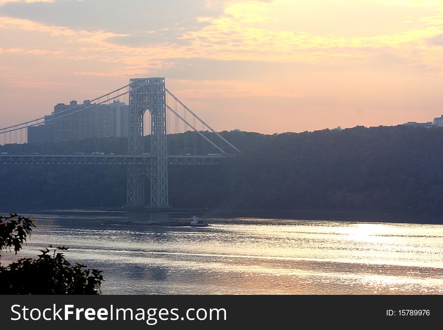 View from Washington bridge connecting New York and New Jersey at sunset. View from Washington bridge connecting New York and New Jersey at sunset