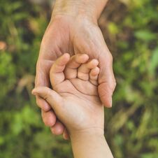 Childs Hand And Old Hand Grandmother. Concept Idea Of Love Family Protecting Children And Elderly People Grandmother Royalty Free Stock Photo