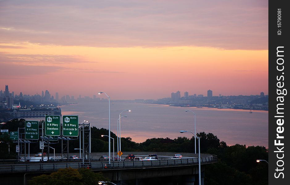 View from Washington bridge connecting New York and New Jersey at sunset. View from Washington bridge connecting New York and New Jersey at sunset