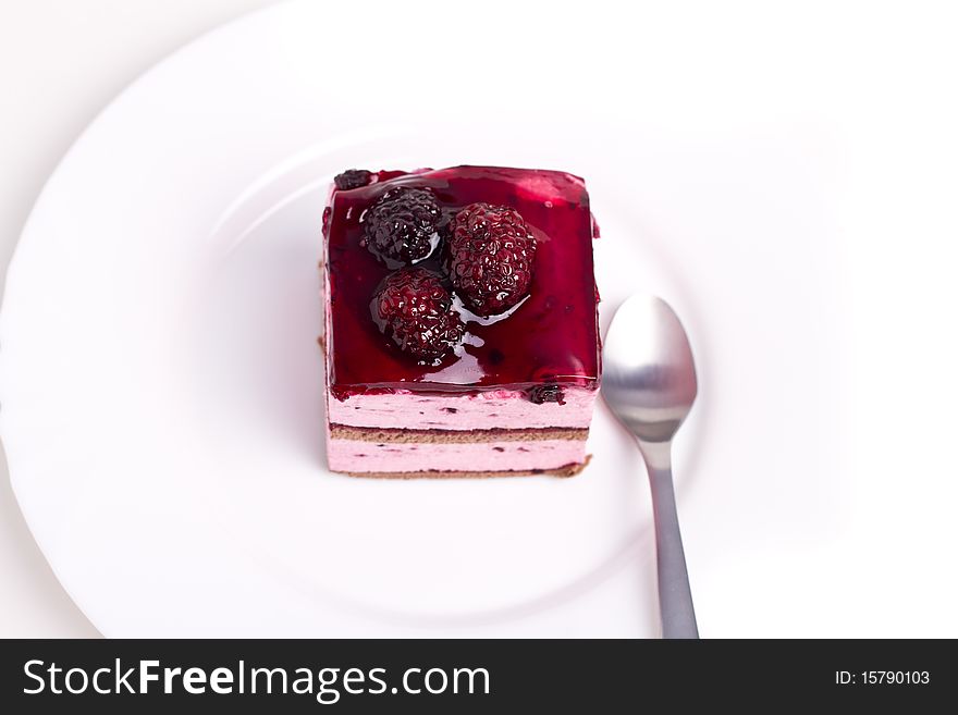 Blackberry cake on a white plate