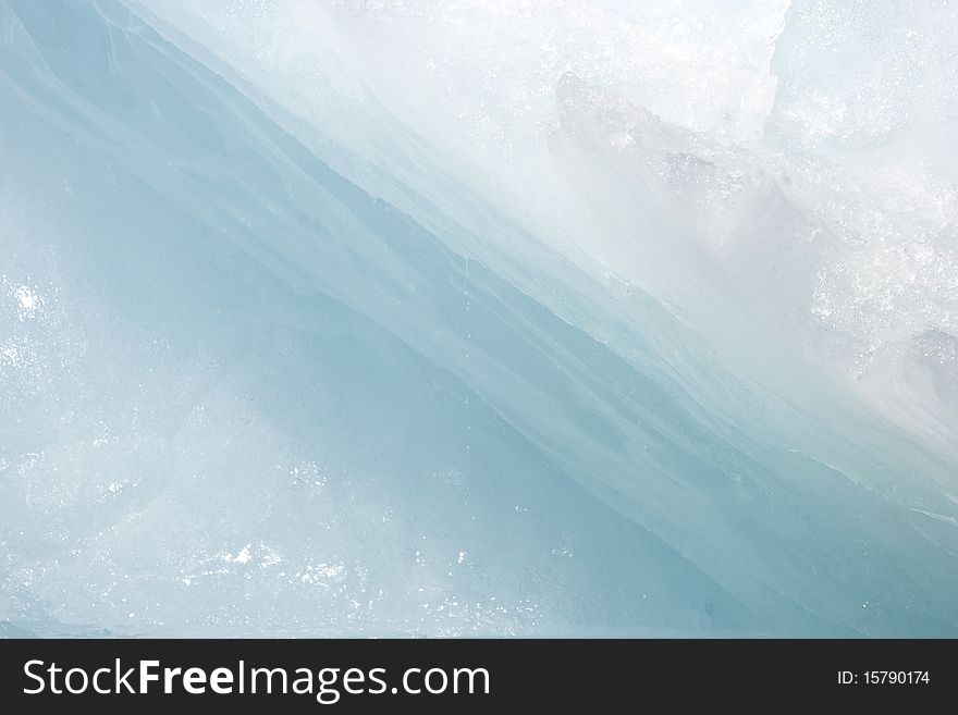 Closeup of pure, sunlit blue ice of iceberg at Jokusarlon Glacial Lagoon, Iceland. Closeup of pure, sunlit blue ice of iceberg at Jokusarlon Glacial Lagoon, Iceland