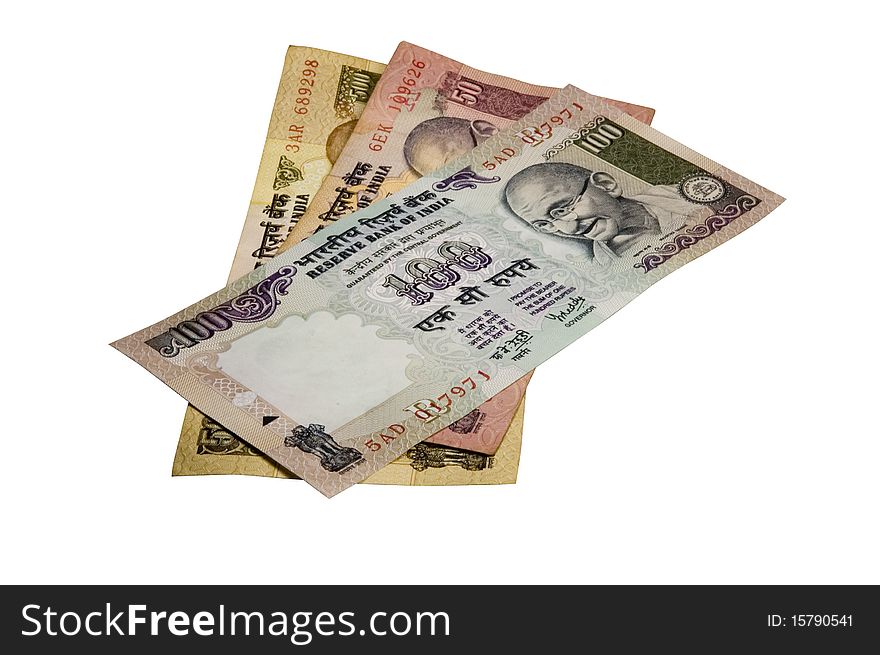 Six hundred fifty Indian Rupees (INR) (Re) in banknotes on a white background. Six hundred fifty Indian Rupees (INR) (Re) in banknotes on a white background.