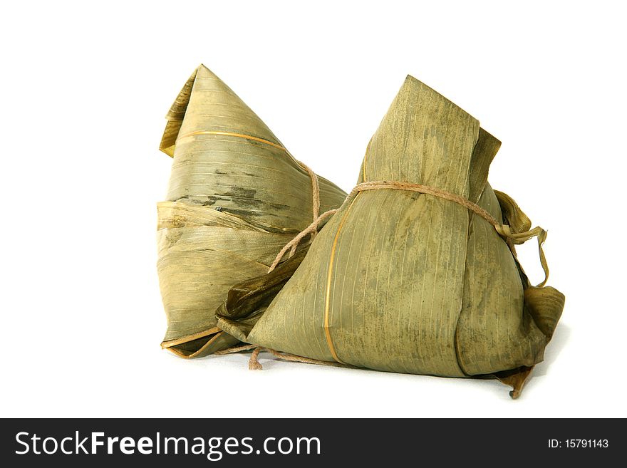 Close up of two Zongzi with white background. Close up of two Zongzi with white background