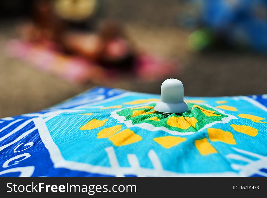 Umbrellas and beach bag