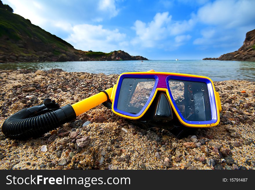 Diving mask and snorkel on the beach in summer. Diving mask and snorkel on the beach in summer