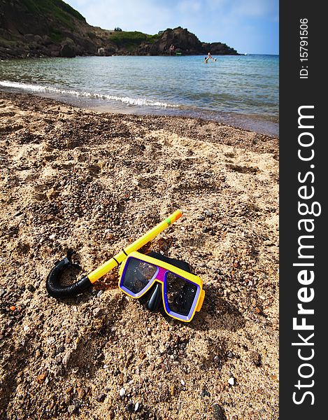 Diving mask and snorkel on the beach in summer. Diving mask and snorkel on the beach in summer