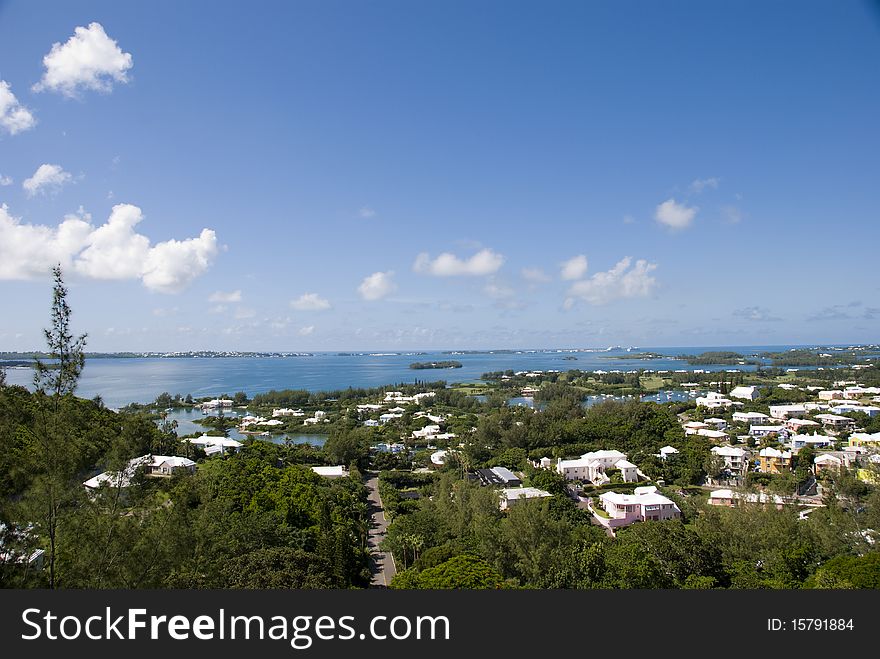 View of tropical island from above a hilltop. View of tropical island from above a hilltop