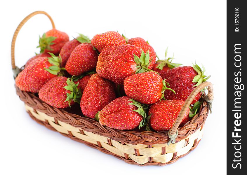 Sweet strawberry in the basket insolated