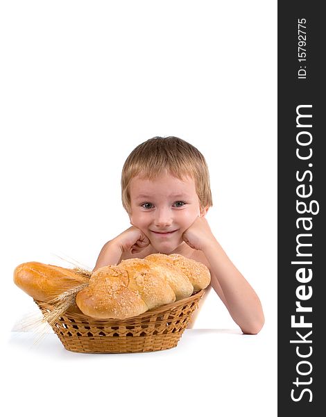 Happy boy with the bread on a white background