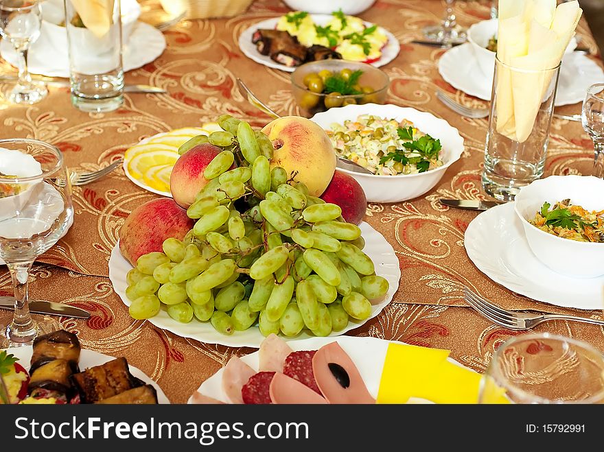 Dining table with a great abundance of different food. Dining table with a great abundance of different food