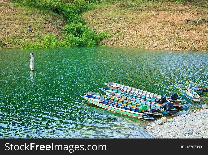 In summer ,I'm going to Sirikit's dam in Uttradhit .I see fishing boat in lake .It's beautiful. Thailand