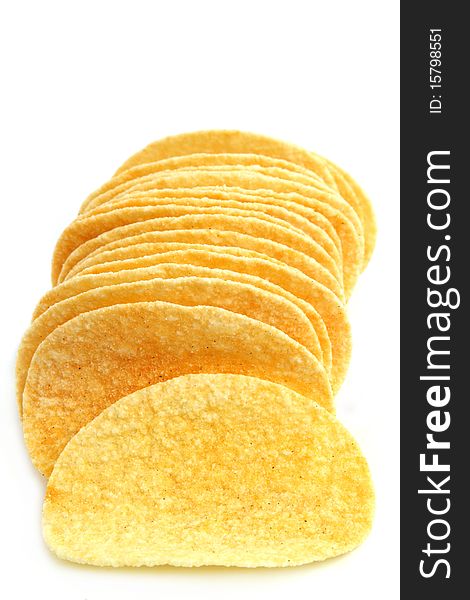Close up of potato chips with white background
