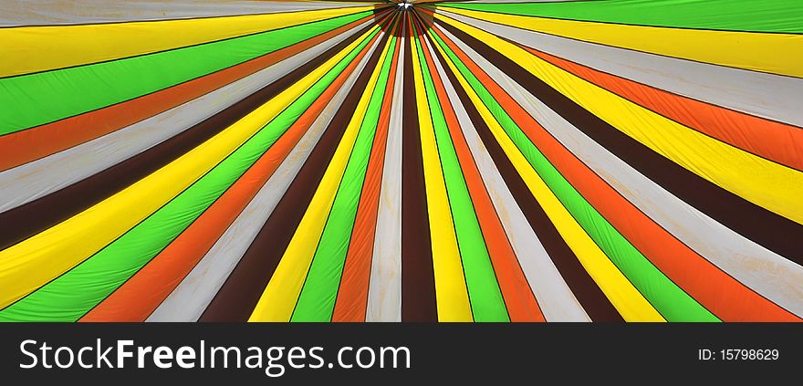 Different diagonal stripes  of different colors on a cloth. Different diagonal stripes  of different colors on a cloth