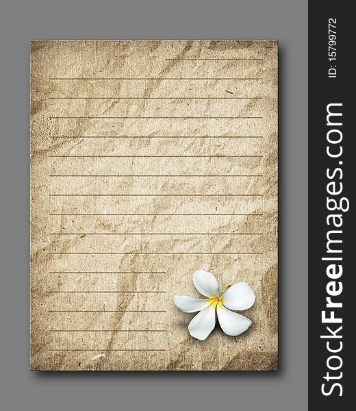 White flower on brown grunge letter paper gray background