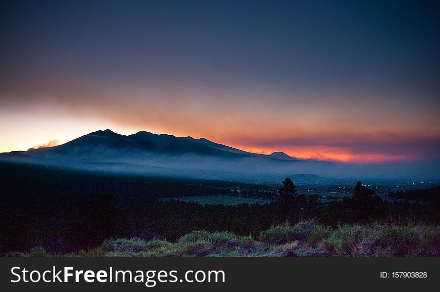 Day 4 of the Schultz Fire, Flagstaff, Arizona. At this point, the fire has consumed over 12,000 acres, including parts of the Schultz Pass area and northern flanks of the Dry Lake Hills, and most of the eastern side of the San Francisco Peaks. Day 4 of the Schultz Fire, Flagstaff, Arizona. At this point, the fire has consumed over 12,000 acres, including parts of the Schultz Pass area and northern flanks of the Dry Lake Hills, and most of the eastern side of the San Francisco Peaks.