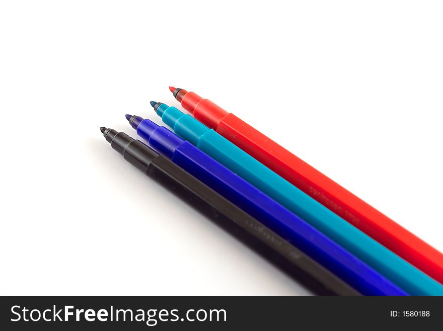 Several colored felt tips (isolated, shallow depth of field.)