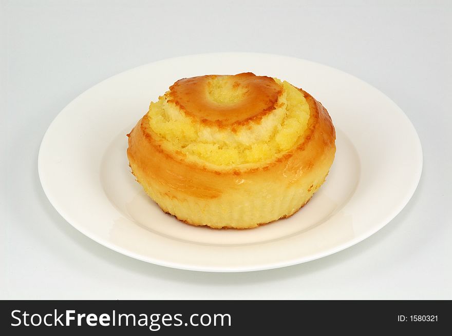 Sweet Bun on White Plate. Sweet Bun on White Plate