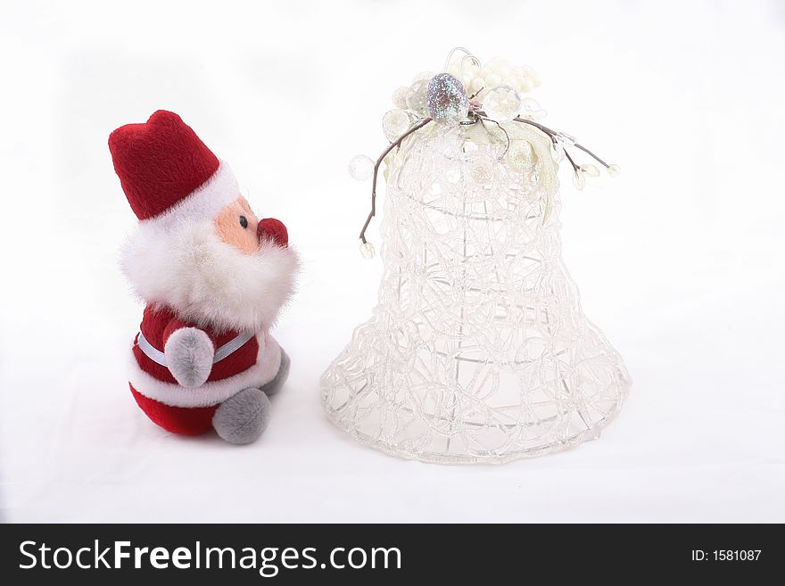 Isolated Santa Claus and white big Christmas bell over white background. Isolated Santa Claus and white big Christmas bell over white background