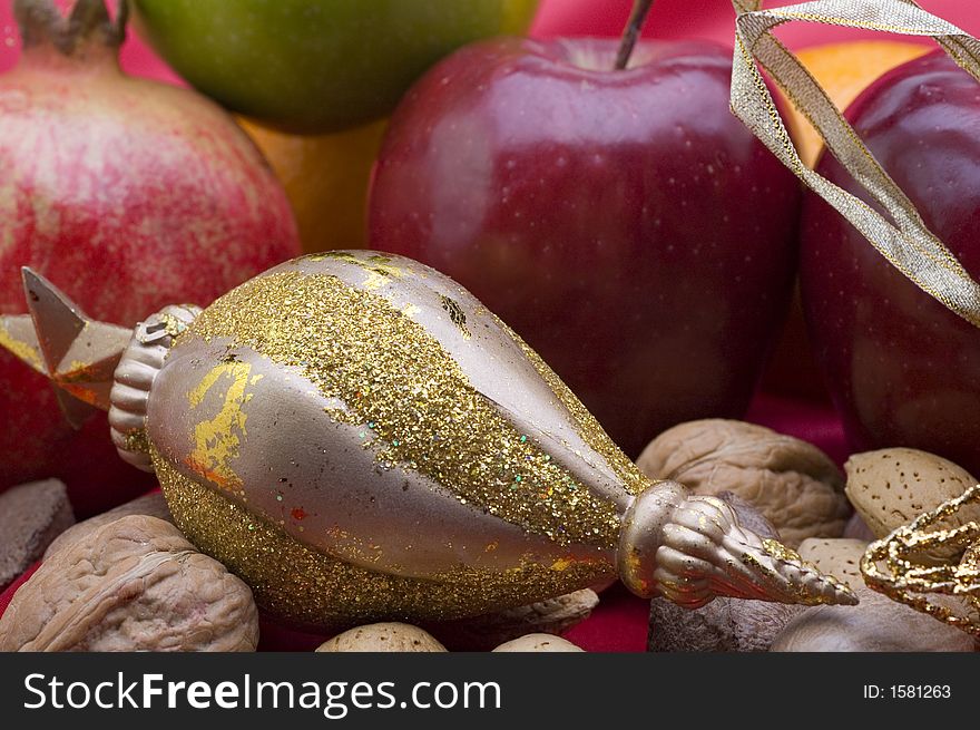 Fruit, nuts in shell and ornament. Fruit, nuts in shell and ornament