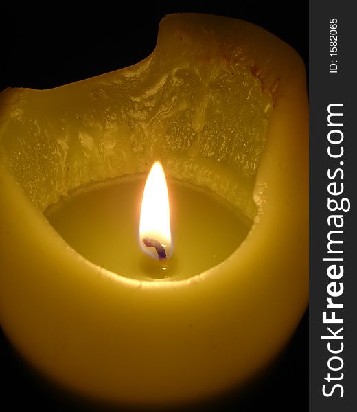 Candle close up with black background