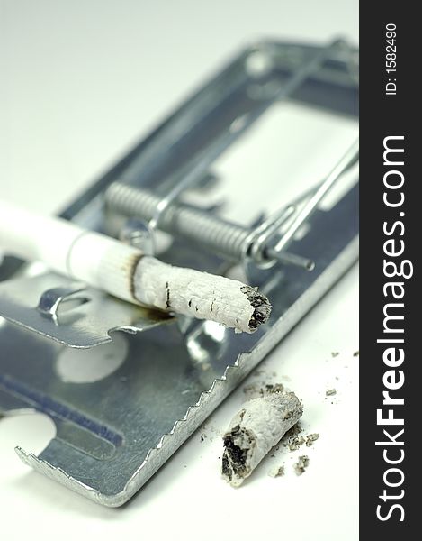 Cigarette trap and concept of taking the risk . Cigarette trap and concept of taking the risk .