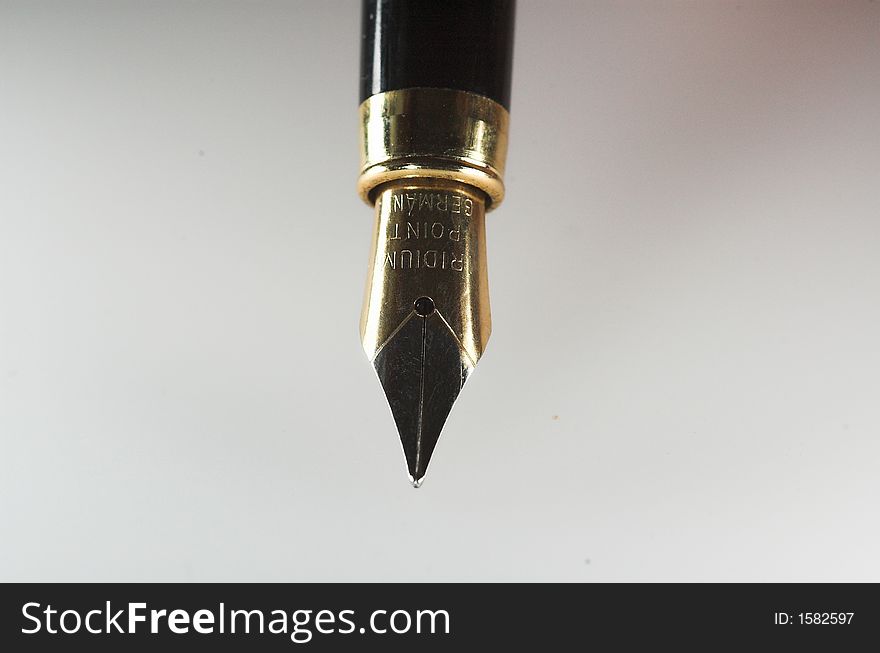 Old gold black pen on withe backgraund