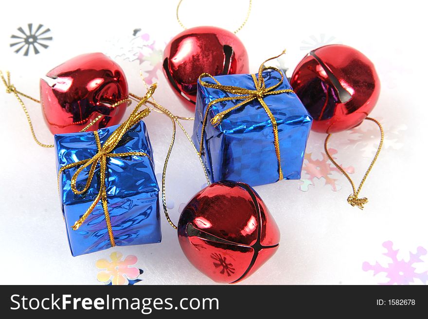 Christmas Ornaments and small gifts on white