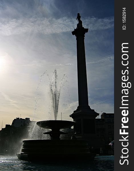 The statue of admiral Nelson with a fountain in London, UK. The statue of admiral Nelson with a fountain in London, UK