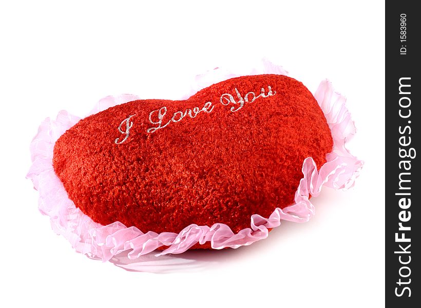 Red heart shaped cushion Valentine concept on white background. Red heart shaped cushion Valentine concept on white background