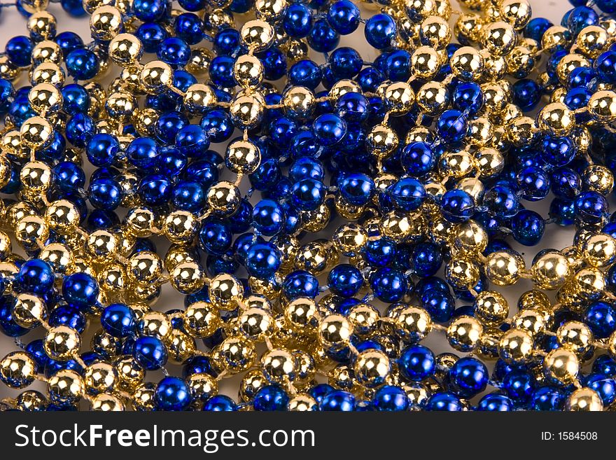 Strings of blue and gold beads
