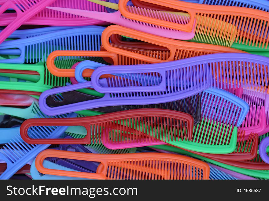 Pile of various colored combs