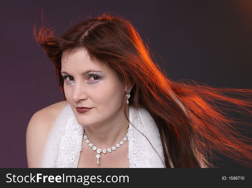 Portrait of a beautiful girl in warm light an wind. Portrait of a beautiful girl in warm light an wind