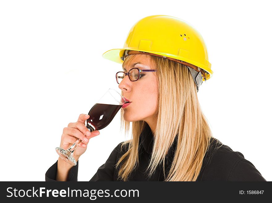 A businesswoman with a glass of wine