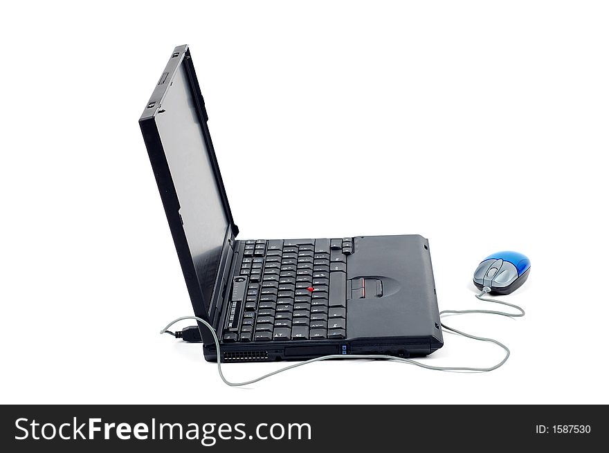 Black laptop with mouse on pure white background. Black laptop with mouse on pure white background