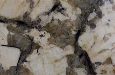 Granite. Pale Yellow And Reddish-brown Shades. Royalty Free Stock Images Granite. Pale Yellow And Reddish-brown Shades. Royalty Free Stock Images